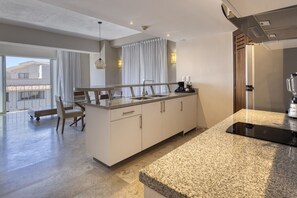 Fridge, microwave, coffee/tea maker, dining tables