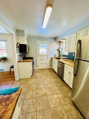 Private kitchen - NFL DRAFT! Charming 2-bedroom house with parking. Minutes from Acrisure/Downtown (Pittsburgh)