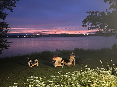 Rustic waterfront farmhouse on Sydney Harbour, with amazing sunset views.