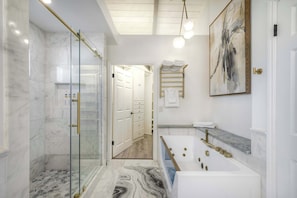 Shower, hair dryer, towels, shampoo