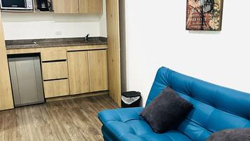 Habitación doble superior | Zona de estar