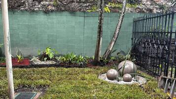 Deluxe Room, Patio | Property grounds