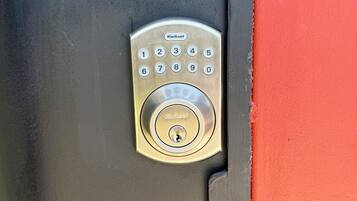 A door with a numeric keypad lock.