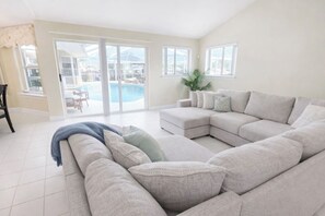 TV, fireplace, stereo - Polynesian Paradise | Waterfront Canal Home + Private Pool (Gulf Breeze)