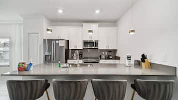 Luxury Villa | Private kitchen | Coffee/tea maker, electric kettle, high chair, dining tables