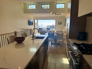 Fridge, microwave, oven, stovetop - New Coastal Luxury Home • Ocean Views • Private Rooftop Deck • Walk to Beach (Dana Point)
