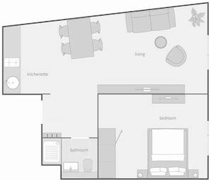 A floor plan with a kitchenette, bathroom, bedroom, and living area. - Smartment Business Berlin Karlshorst (Berlin)