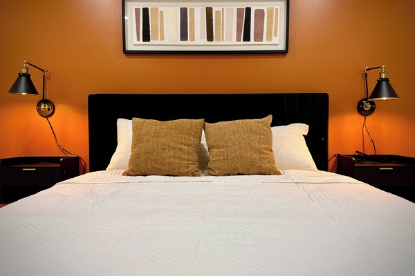 Relaxing Queen Bedroom with Warm Tones & Inviting Atmosphere