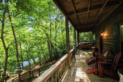 Hunker Down by the Creekbank in this Cozy Private