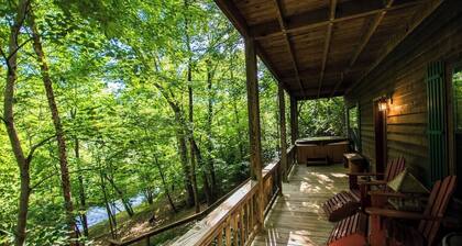 Hunker Down by the Creekbank in this Cozy Private