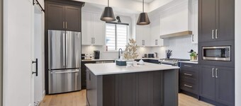 Exquisite & Luxurious Family Home with newly built, bright and stylish 6-bedroom, 3.5-bath home in Langley. We offers comfort and smart design, perfect for families, groups, or business travelers, close to parks and shopping.