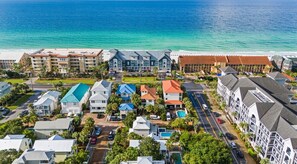 A coastal resort with a pool, beachfront view, and multiple buildings. - 3-Mins to Beach~Pet Friendly Home~Private Pool~Optional Golf Cart~Destin's Crystal Beach. (Destin)