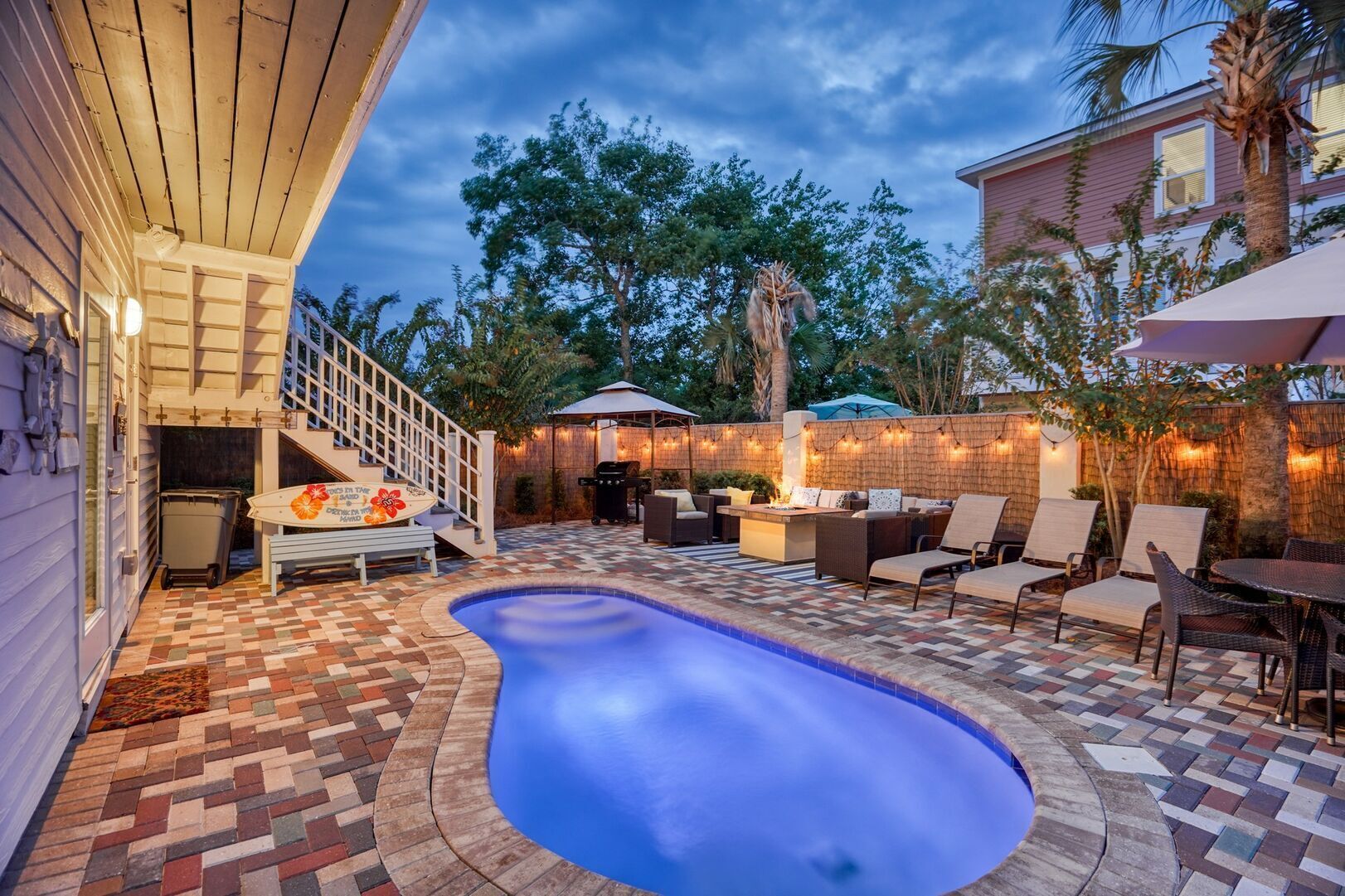 Your own private backyard oasis — luxury pool surrounded by beautiful outdoor living space for total relaxation.