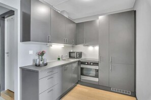 Private kitchen - Forenom Apartments Carl Berners Plass (Oslo)