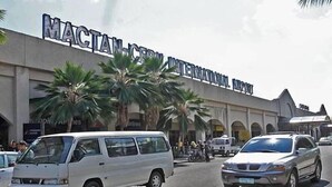 A building with a sign reading "MACTAN-CERU INTERNATIONAL AIRPORT". - Mactan-cebu Airport Budget Hotel (Lapu-Lapu)