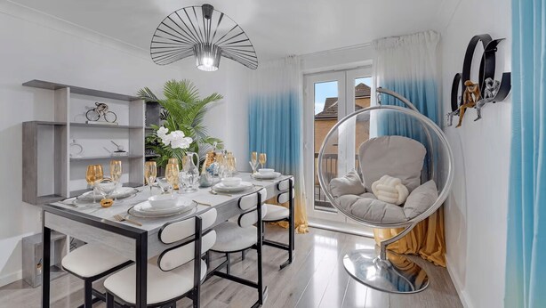 A modern dining area with a round table set for six, a hanging chair, and a unique ceiling light fixture. - Peaceful 2BR Flat |Near Becontree Stn.|Family|ST (Greater London)