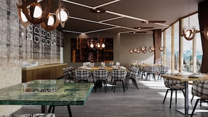 A modern dining area with a long table set for a meal, surrounded by plaid chairs, and featuring a rustic wooden ceiling with hanging light fixtures. - Campzero Active & Luxury Resort (Ayas)