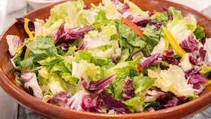 A bowl of mixed green and purple salad. - Double Pretty Hotel (Taichung)