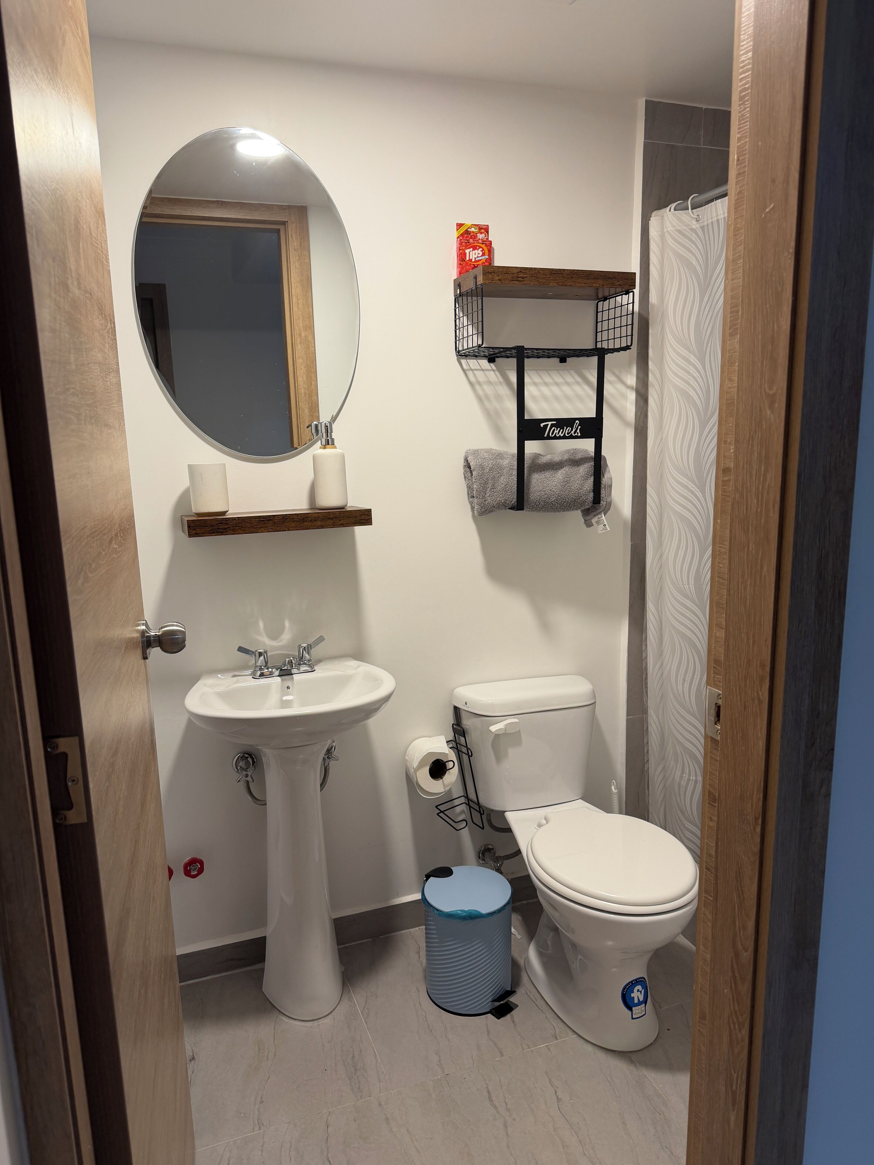 Shower, towels, soap, toilet paper