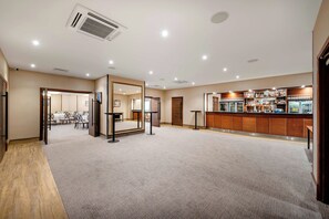 A hotel lobby with a bar area, seating arrangements, and a reception desk. - Thatchers Bw Signature Collection By Best Western (Leatherhead)