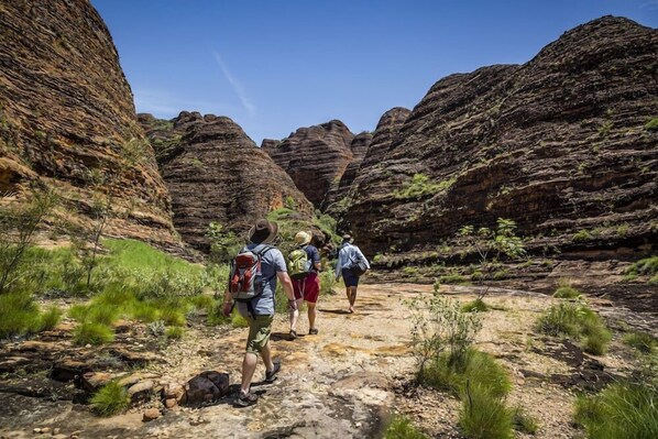 A narrow canyon path with hikers. - Bungle Bungle Bush Camp (Ord River)
