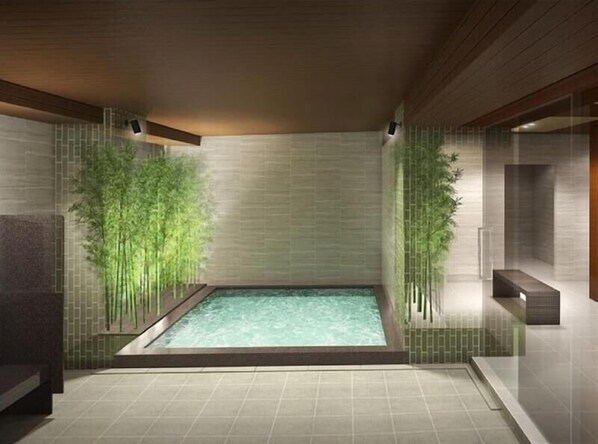 A modern spa room with a rectangular hot tub, bamboo plants, and a minimalist design. - Daiwa Royal Hotel D City Nagoya Fushimi (Nagoya)