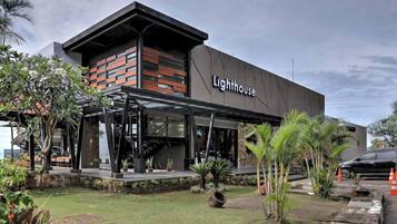 A modern building with a sign reading "Lighthouse."