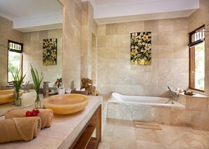 A modern bathroom with a large oval sink, a freestanding bathtub, and two wall-mounted mirrors. - Green Field Hotel And Bungalow (Ubud)