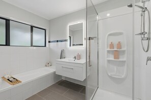 Shower, hair dryer, towels, soap