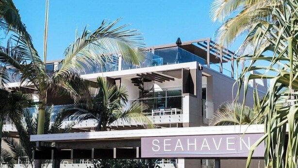 A modern building with a sign reading "SEAHAVEN". - Seahaven Resort (Sunshine Coast)