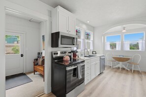 Fridge, microwave, oven, stovetop - Relax at Stephens Legacy Farmhouse, a spacious 4BR retreat with valley and mountain views (Dayton)