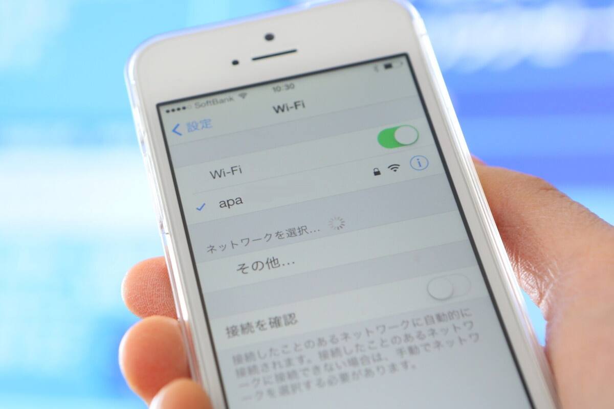 A smartphone displaying a Wi-Fi settings screen with options for network selection.
