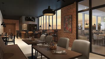 Interior moderno de restaurante com paredes de tijolo, janelas amplas e mobiliário contemporâneo.