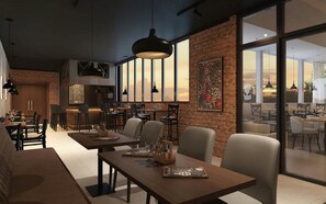 A modern restaurant interior with brick walls, large windows, and contemporary furniture. - de Baghraf Hotel Sumenep by Amithya (Sumenep)