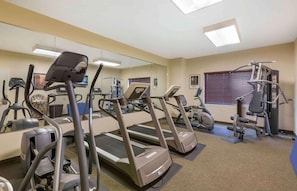 A gym with treadmills, elliptical machines, and weight equipment. - Extended Stay Americas Suites Minot Ex Noble Inn (Minot)