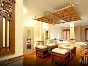 A room with two wooden beds, a large mirror, and a wooden ceiling structure. - The Cangkringan Jogja (Cangkringan)