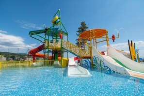 A water park with multiple slides and water features. - Nevis Resort & Aqua Park - All Inclusive (Nessebar)