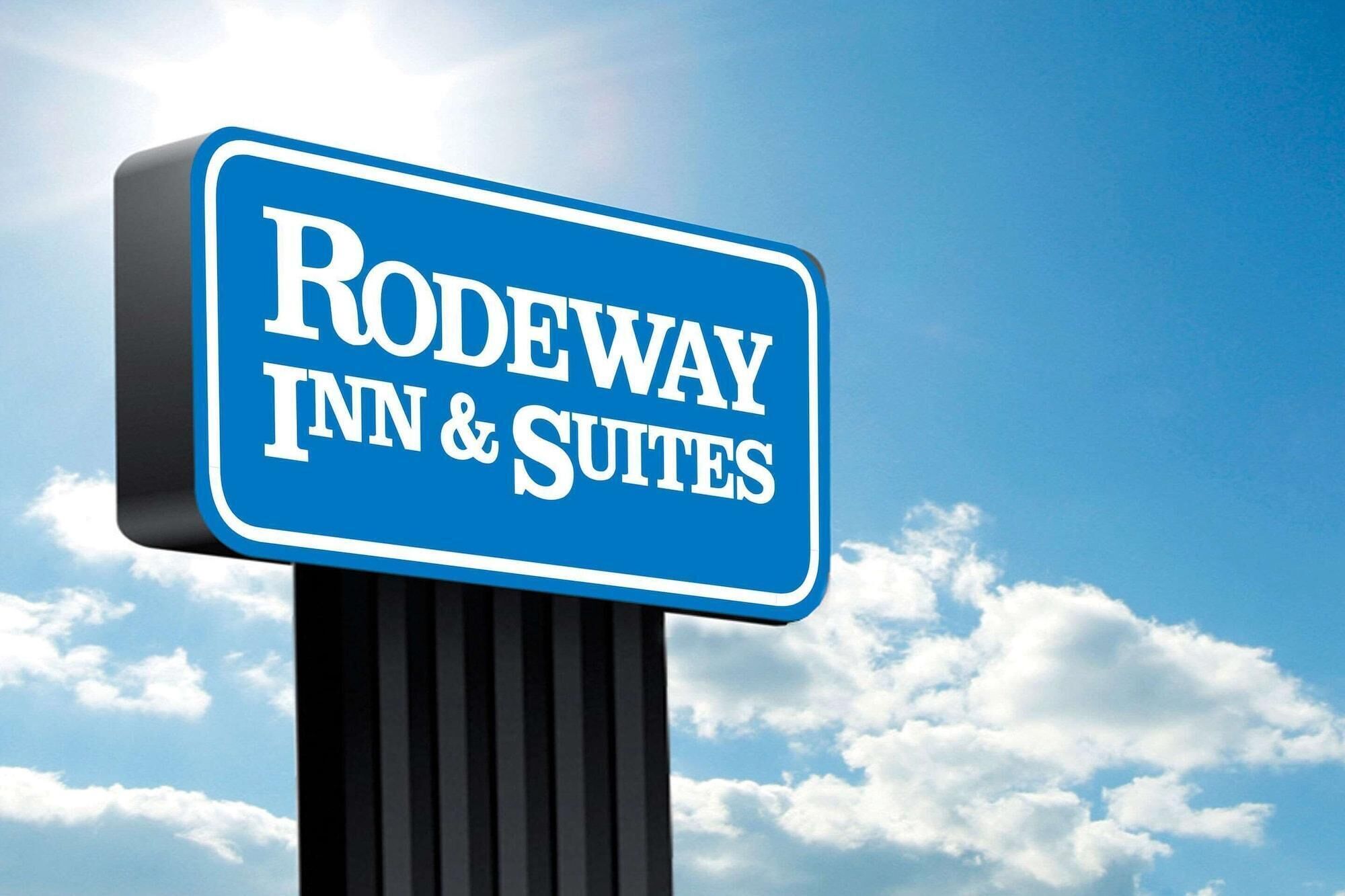 A sign for Rodeway Inn & Suites.
