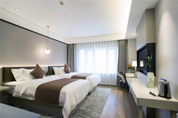 A modern hotel room with two beds, a desk, a flat-screen TV, and a large window with curtains. - GYA Shanghai Long Distance Passenger Terminal Hotel (Shanghai)