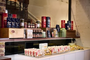 A display of food products including jars, boxes, and packaged goods. - Holiday Inn West Perth (Perth)