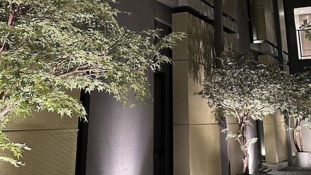 A modern indoor space with large planters and a high ceiling. - Fulmar Pasteur (Bandung)