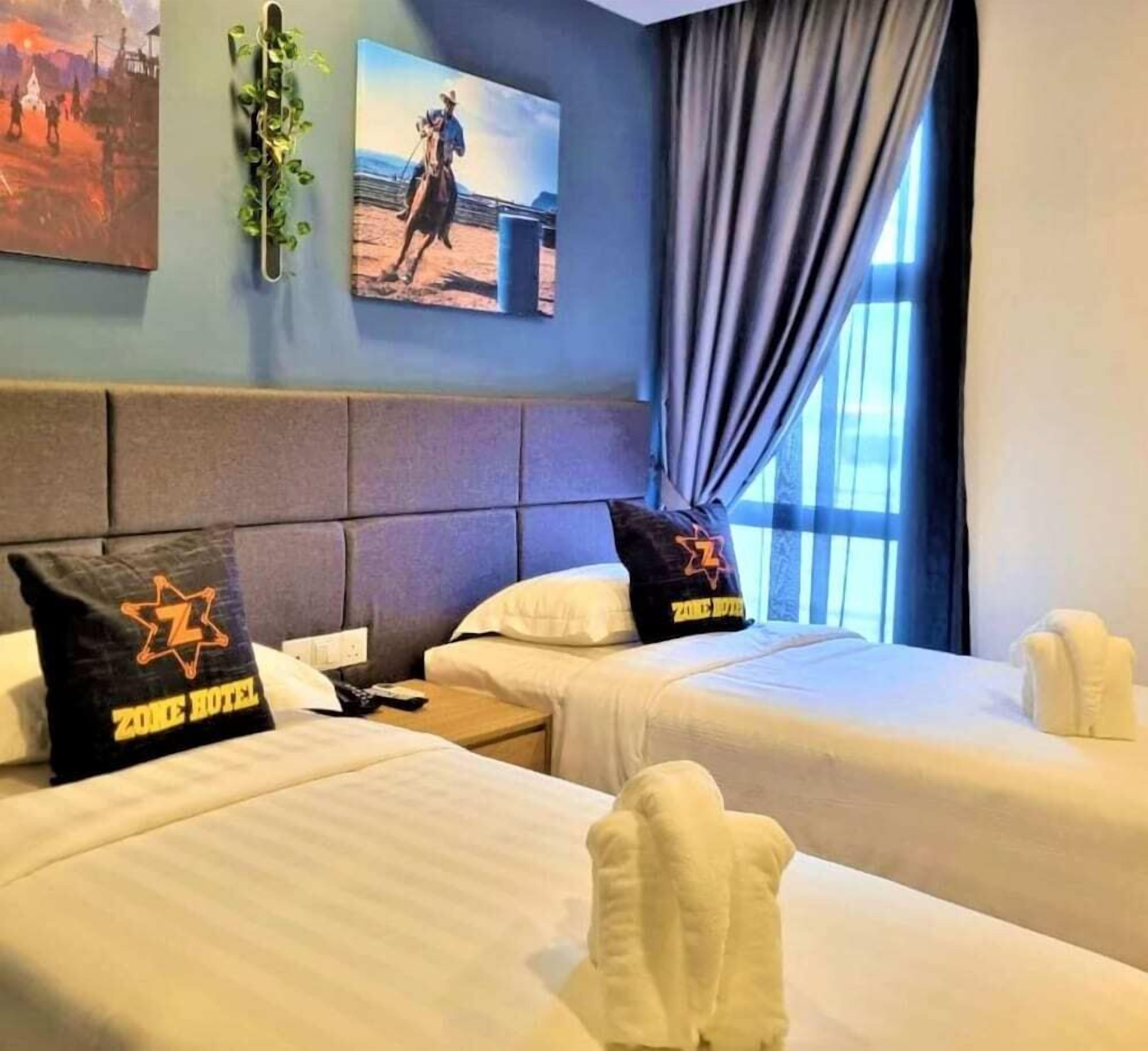 A hotel room with two beds, a headboard, a window with curtains, and a painting on the wall.