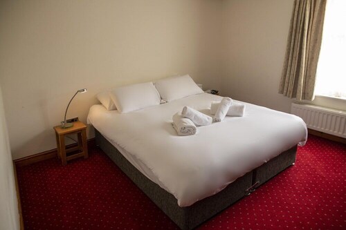 The Knighton Hotel by Payman Club