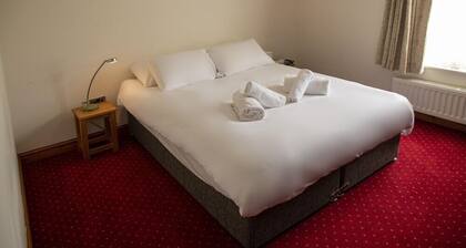 The Knighton Hotel by Payman Club