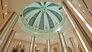 A grand lobby with a large, ornate ceiling and tall columns. - Sunny Days Palma De Mirette Resort (Hurghada)
