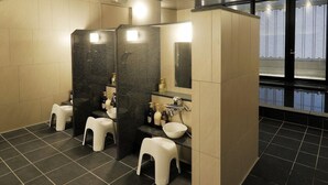 A modern bathroom with two sinks, a mirror, and a toilet. - JR Inn Sapporo N2 (Sapporo)