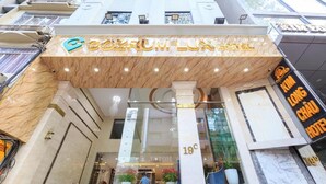 A hotel entrance with a marble facade, a sign reading "Galleria Lux Hotel," and a visible floor number "19C." - Sazi Resin Hotel - Free Nails/hairwash (Ho Chi Minh City)