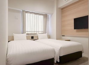 A hotel room with two beds, a flat-screen TV mounted on the wall, and a window with sheer curtains. - Hotel Mid in Kuramae Ekimae (Tokyo)