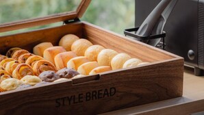 A wooden bread box labeled 'STYLE BREAD' with various baked goods. - Hotel Mid in Kuramae Ekimae (Tokyo)