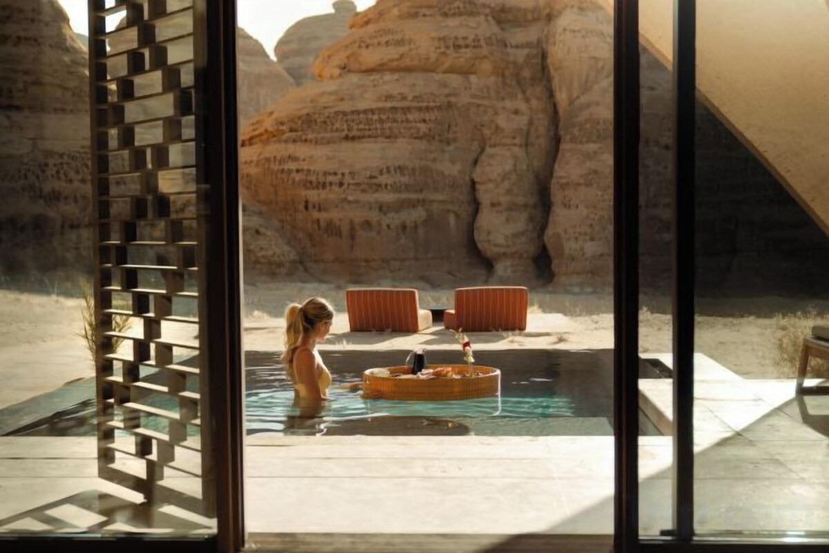 A pool area with a clear view of the surrounding rock formations.